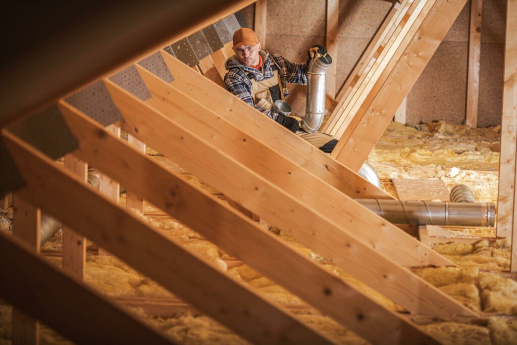 Technician in insulated attic